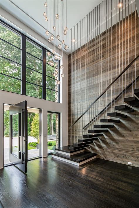 modernist contemporary house with metal stairwell|modern interior stairs design.